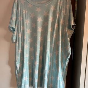 Short sleeved light blue with white stars T-shirt